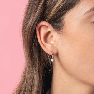 Orecchini Fabiani a cerchio in argento con zircone a cuore pendente - Fabiani Gioiellerie