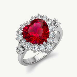 Anello Gemmarara con pietra rossa taglio cuore in oro 9 Kt e diamanti