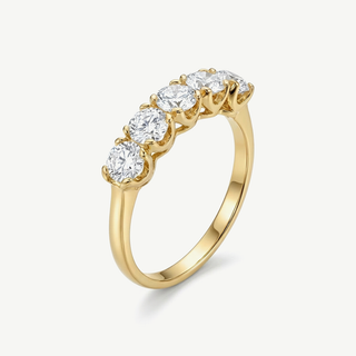 Anello riviera in oro giallo 9kt con zirconi taglio brillante montati a griffe