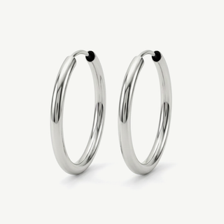 Orecchini Fabiani a cerchio lisci in oro bianco 18kt