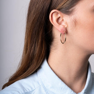 Orecchini Fabiani con canna liscia in oro giallo 18Kt - Fabiani Gioiellerie