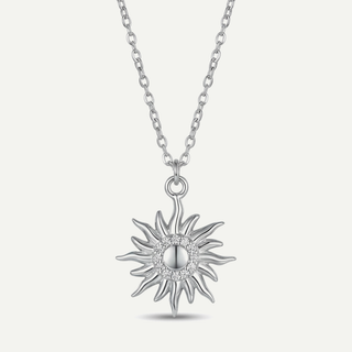 Collana Meridien in acciaio con pendente sole pavé